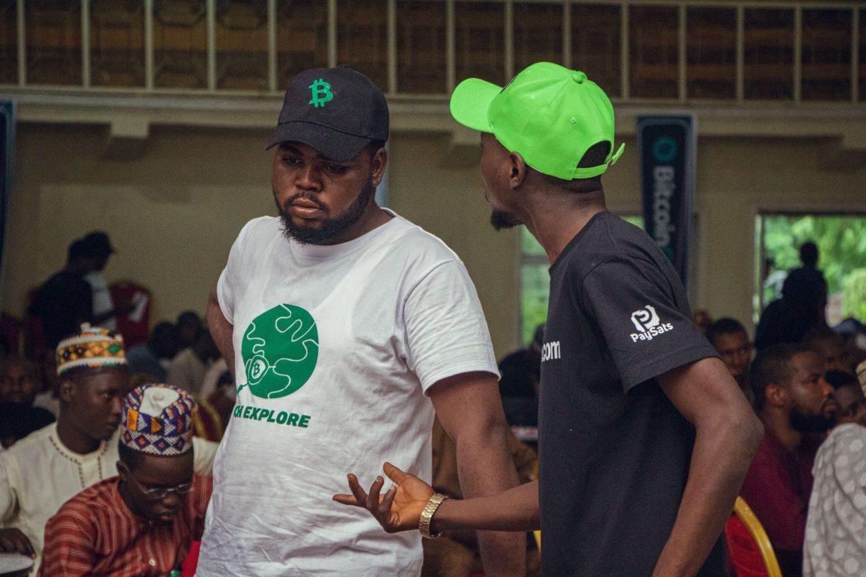 Mentors guiding participants at an event